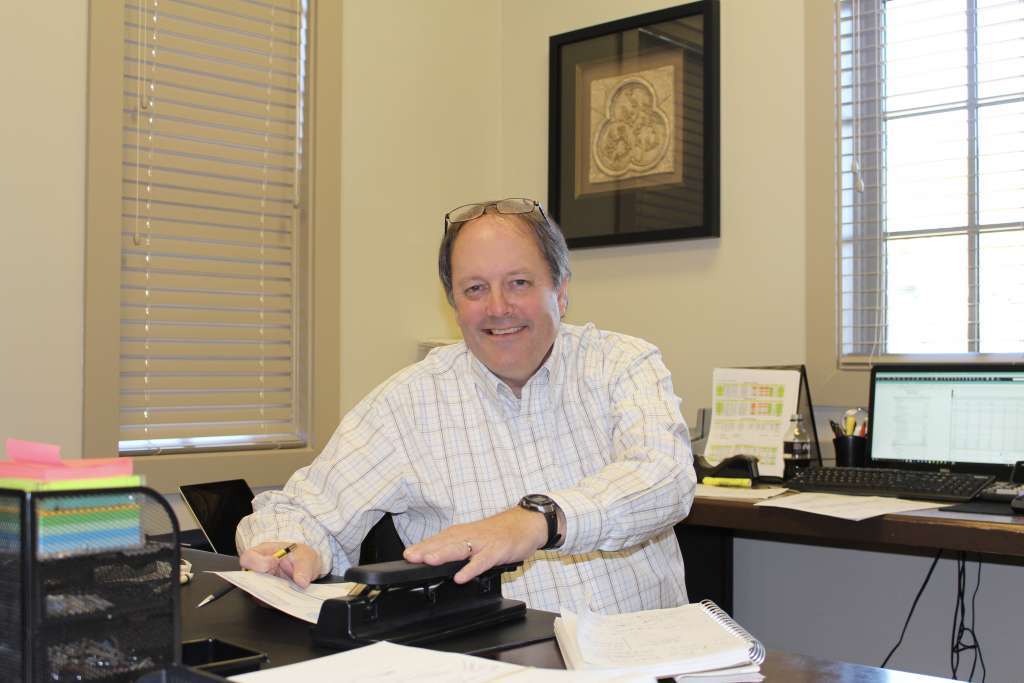 Richard Force, Tower Homes Controller in his new office after renovation